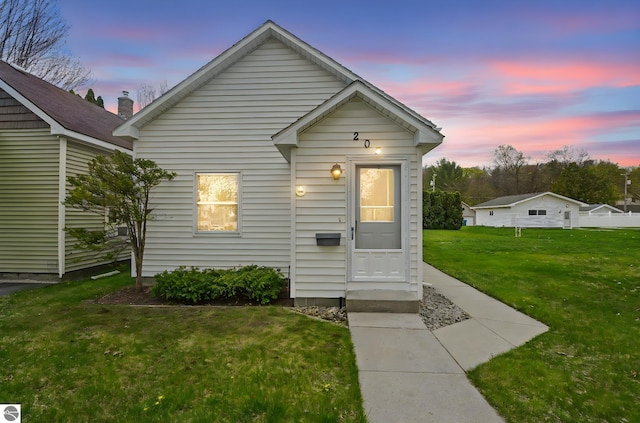 203 W Sixteenth St, Traverse City, MI 49684 - view of front facade featuring a yard