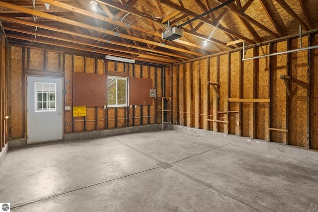 203 W Sixteenth St, Traverse City, MI 49684 - garage featuring a garage door opener