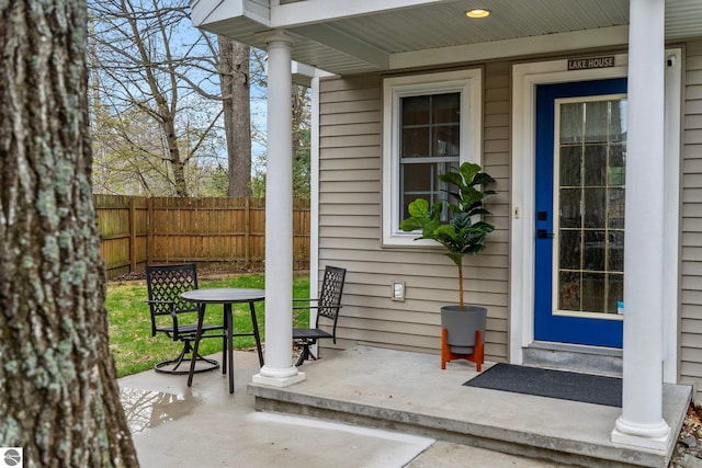 5945 E M-55, Cadillac, MI 49601 - view of patio / terrace with fence and covered porch