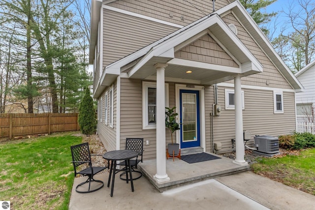 5945 E M-55, Cadillac, MI 49601 - property entrance with central air condition unit