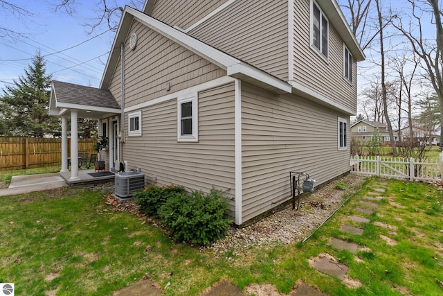 5945 E M-55, Cadillac, MI 49601 - view of side of home with cooling unit