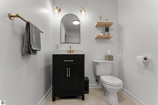 5945 E M-55, Cadillac, MI 49601 - half bathroom with toilet, tile patterned flooring, baseboards, and vanity