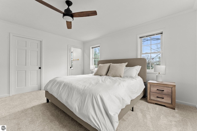 5945 E M-55, Cadillac, MI 49601 - bedroom with ornamental molding, carpet floors, baseboards, and a ceiling fan