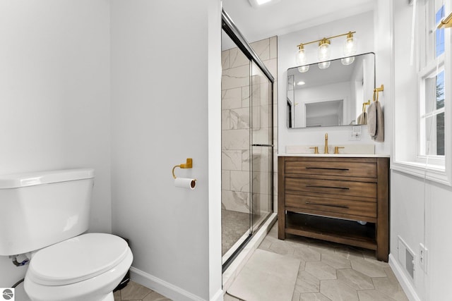 5945 E M-55, Cadillac, MI 49601 - full bath with a shower stall, toilet, vanity, and baseboards