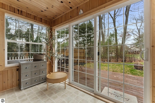 5945 E M-55, Cadillac, MI 49601 - sunroom with wood walls