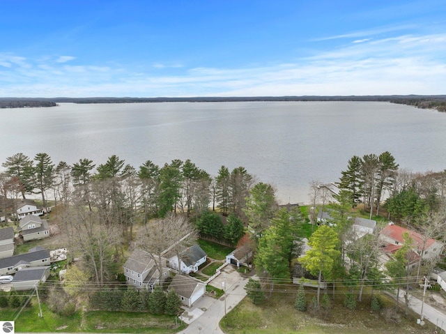 5945 E M-55, Cadillac, MI 49601 - aerial view of property and surrounding area with a nearby body of water and nearby suburban area
