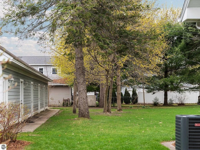 view of yard with central AC