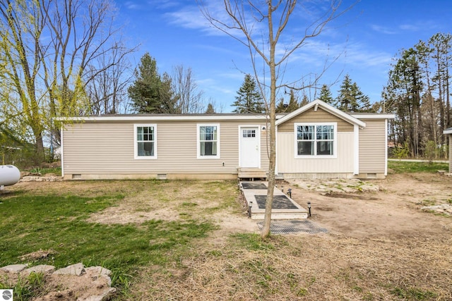 back of property with crawl space