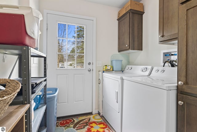 214 E N St, Buckley, MI 49620 - laundry room with washer and clothes dryer and cabinet space