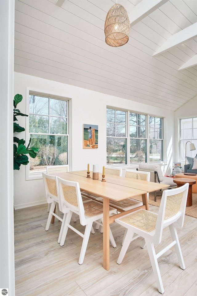 sunroom / solarium with plenty of natural light and lofted ceiling