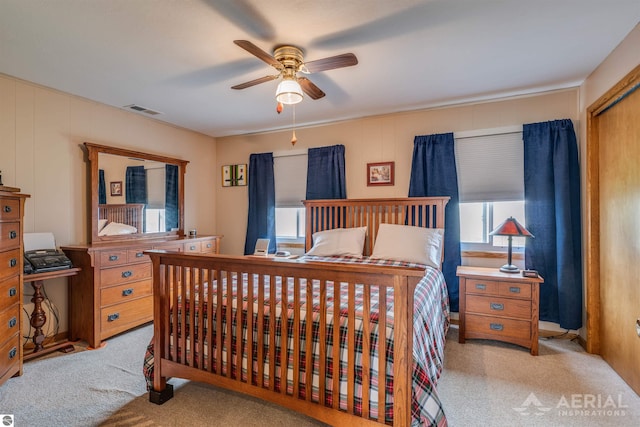 bedroom with carpet and ceiling fan