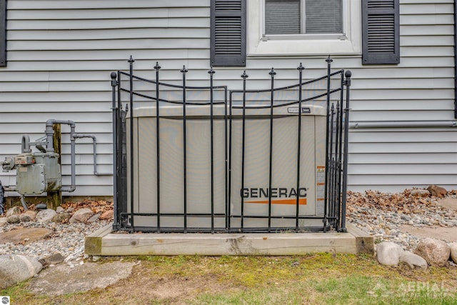 exterior view of a gate and gas meter