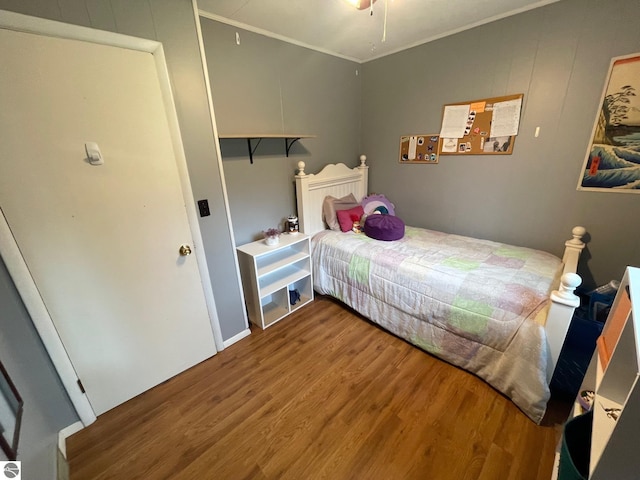 1993 W St, Central Lake, MI 49622 - bedroom with wood finished floors and ornamental molding