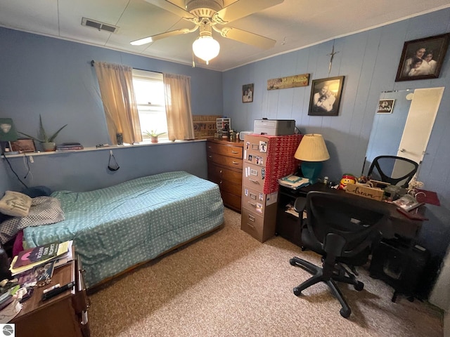1993 W St, Central Lake, MI 49622 - carpeted bedroom featuring a desk and a ceiling fan