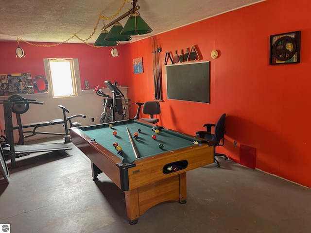 1993 W St, Central Lake, MI 49622 - game room featuring a textured ceiling and pool table