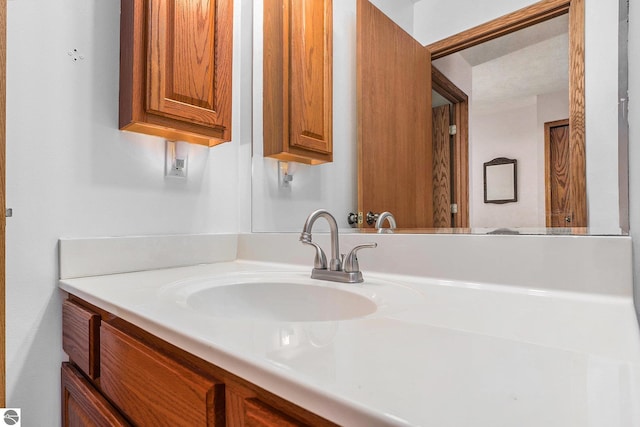 3691 Eastview Dr Unit 67, Traverse City, MI 49684 - bathroom featuring vanity