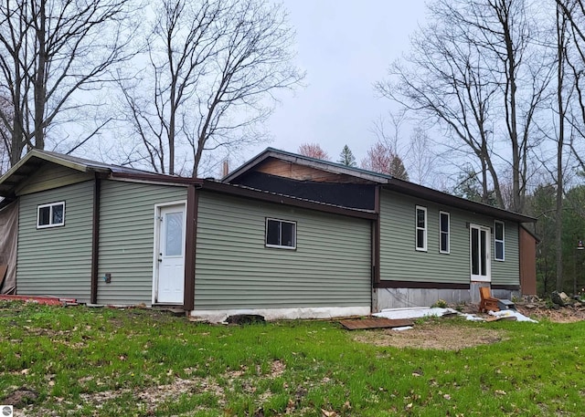 21187 Parkview Rd, Tustin, MI 49688 - view of property exterior featuring a yard