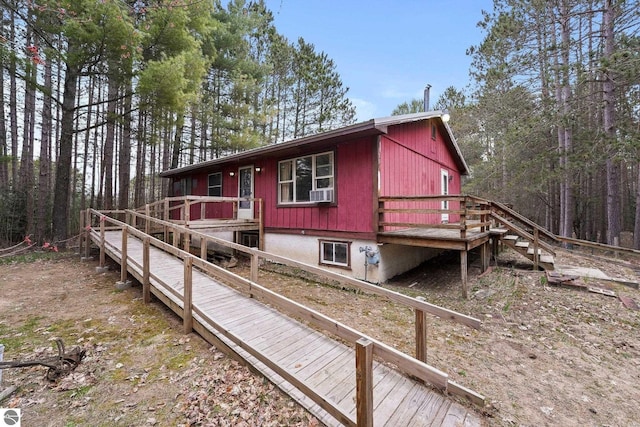 view of front of house featuring a deck and stairs