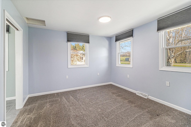 4507 Maidens Rd, Onekama, MI 49675 - empty room with carpet flooring and baseboards