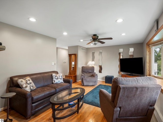 9311 Whipple Shores Dr, Clarkston, MI 48348 - living area featuring a ceiling fan, light wood-style flooring, recessed lighting, and baseboards