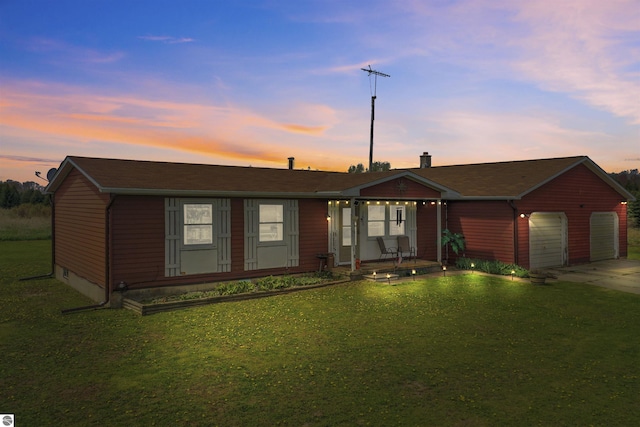 3610 S Call Rd, Lake City, MI 49651 - ranch-style home with a lawn, concrete driveway, and covered porch