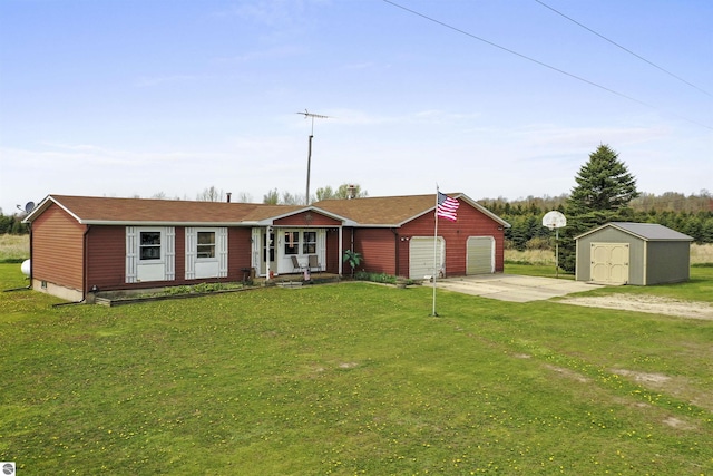 3610 S Call Rd, Lake City, MI 49651 - ranch-style house featuring a storage unit, a front yard, driveway, and an outbuilding