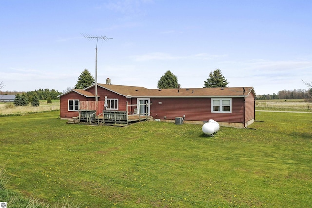 3610 S Call Rd, Lake City, MI 49651 - back of house with a wooden deck and a yard