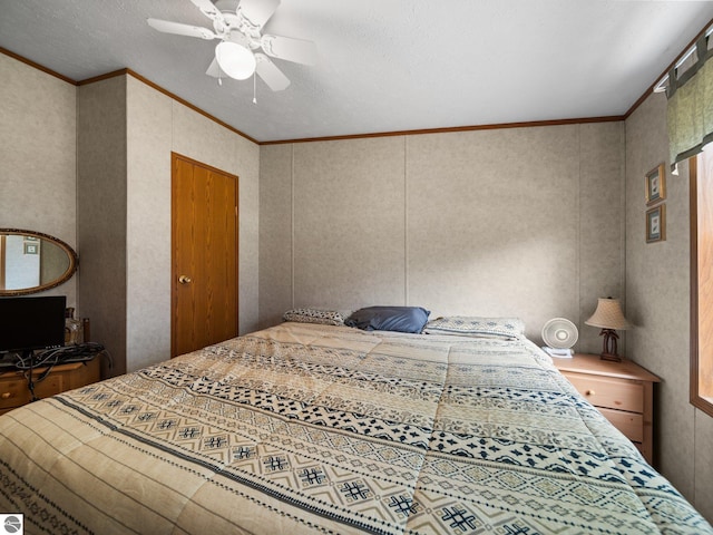12036 SW Spring Creek Rd, Fife Lake, MI 49633 - bedroom featuring ornamental molding and ceiling fan
