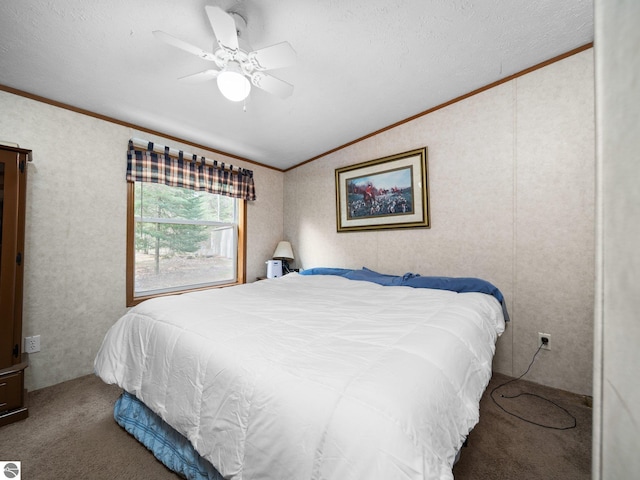 12036 SW Spring Creek Rd, Fife Lake, MI 49633 - carpeted bedroom featuring vaulted ceiling, crown molding, ceiling fan, and a textured ceiling