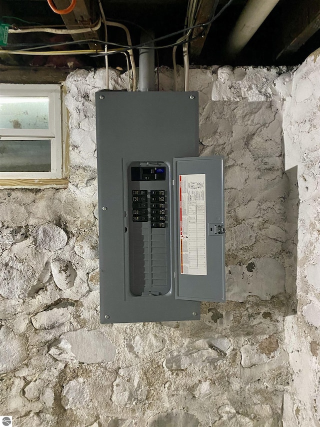 utility room featuring electric panel
