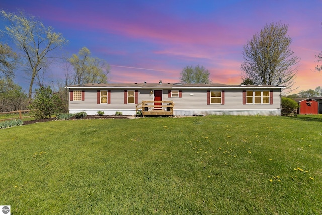 10946 N Rich Rd, Alma, MI 48801 - manufactured / mobile home with a storage unit and an outdoor structure