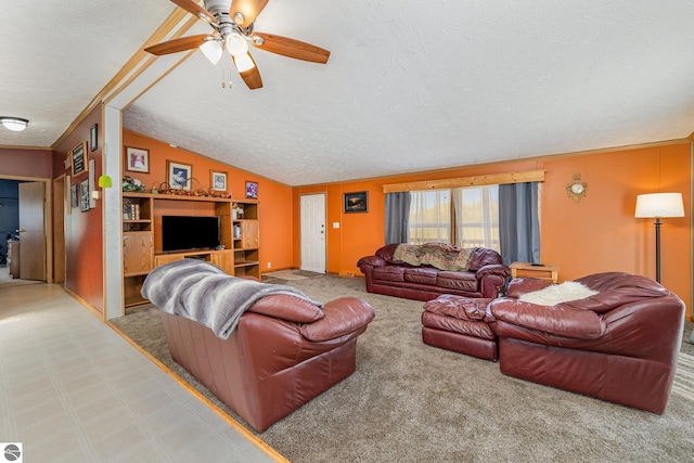 10946 N Rich Rd, Alma, MI 48801 - carpeted living room with a textured ceiling, vaulted ceiling, ceiling fan, and baseboards