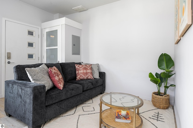 living area with electric panel