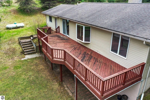 11531 S Tower Rd, Maple City, MI 49664 - deck with stairway and a yard