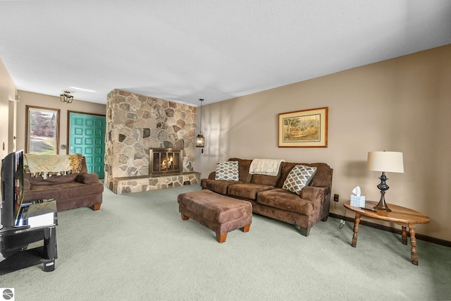 11531 S Tower Rd, Maple City, MI 49664 - carpeted living room featuring a stone fireplace