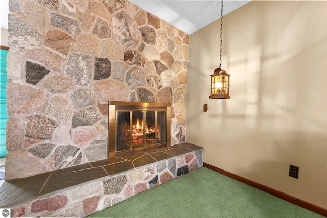 11531 S Tower Rd, Maple City, MI 49664 - detailed view of a stone fireplace, carpet, and baseboards