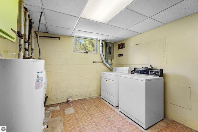 11531 S Tower Rd, Maple City, MI 49664 - washroom with water heater, separate washer and dryer, concrete block wall, and electric panel