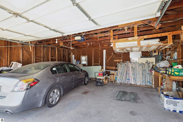 1040 Eastward St, Alma, MI 48801 - garage featuring a garage door opener