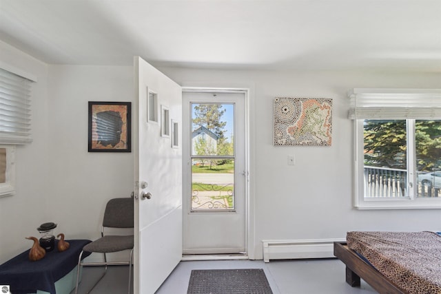 1040 Eastward St, Alma, MI 48801 - doorway to outside with baseboard heating
