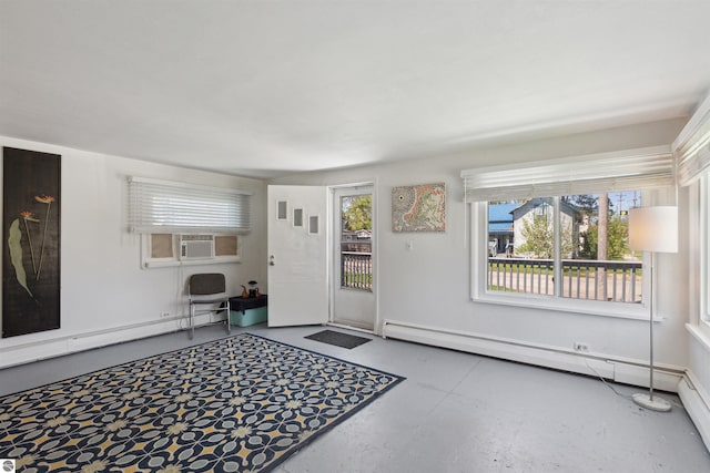 1040 Eastward St, Alma, MI 48801 - entryway with a baseboard heating unit, concrete floors, and cooling unit