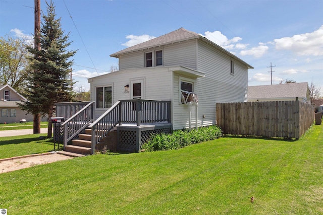 1040 Eastward St, Alma, MI 48801 - view of front of house featuring a deck and roof with shingles