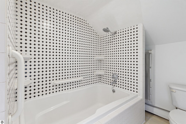 1040 Eastward St, Alma, MI 48801 - full bath with vaulted ceiling, a baseboard heating unit, a shower, toilet, and a relaxing tiled tub