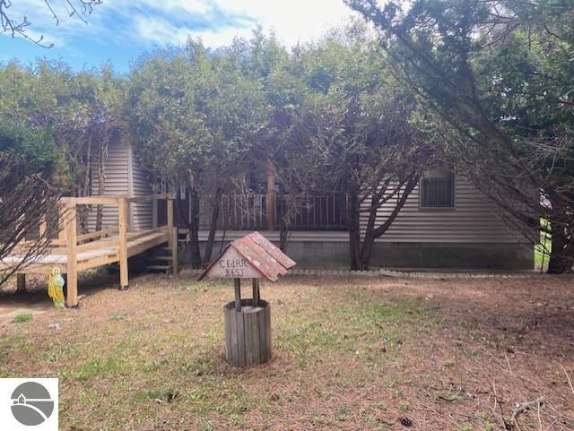 8067 Cherry Ave, Rapid City, MI 49676 - view of yard