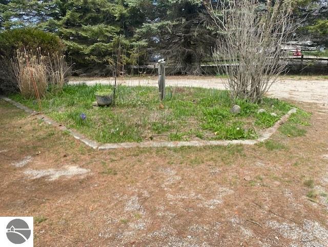 8067 Cherry Ave, Rapid City, MI 49676 - view of yard