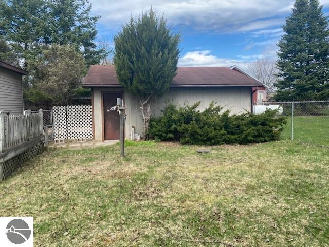 8067 Cherry Ave, Rapid City, MI 49676 - view of front facade
