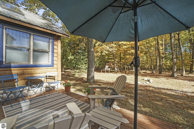 421 S Shabwasung St, Northport, MI 49670 - view of patio / terrace with a deck