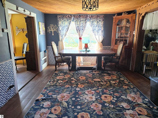 117 S Gladwin St, Lake City, MI 49651 - dining space featuring wooden ceiling and wood finished floors