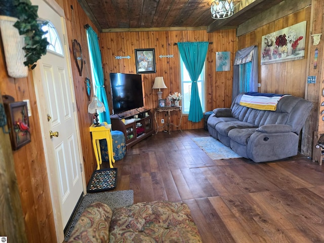 117 S Gladwin St, Lake City, MI 49651 - living area with wooden walls, wood ceiling, and hardwood / wood-style flooring
