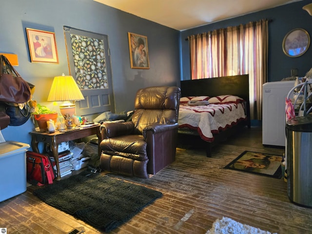 117 S Gladwin St, Lake City, MI 49651 - bedroom with hardwood / wood-style floors