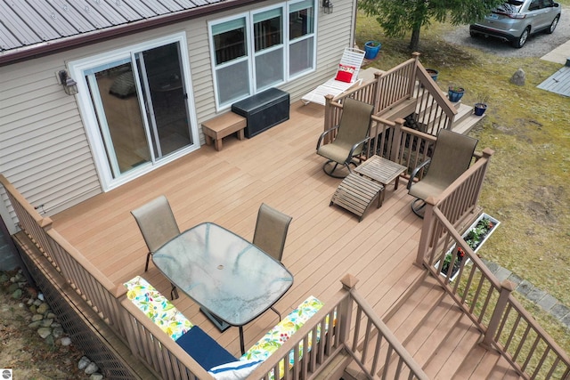1750 S Schneider St, Lake City, MI 49651 - wooden terrace featuring outdoor dining space and stairway